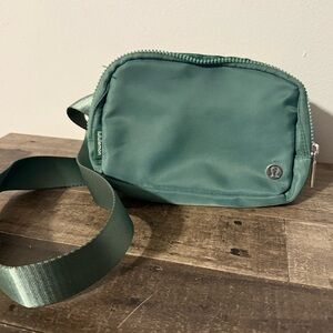 lululemon athletica Green Belt Bag with Zipper Closure and Matching Strap